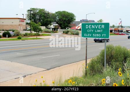 City limit street sign where Aurora, Colorado meets Denver informing visitors of the Mile High City's 5280 foot elevation, one mile above sea level. Stock Photo