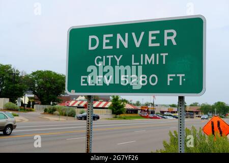 City limit street sign where Aurora, Colorado meets Denver informing visitors of the Mile High City's 5280 foot elevation, one mile above sea level. Stock Photo