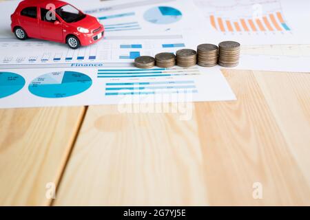 Money, chart and Red Car Stock Photo