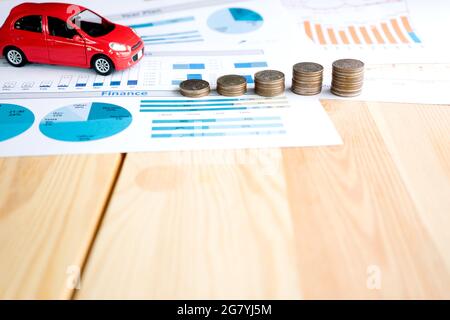 Money, chart and Red Car Stock Photo