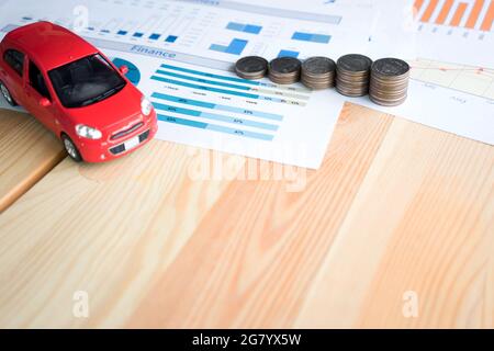 Money, chart and Red Car Stock Photo
