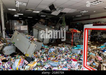 Bad Neuenahr, Germany. 16th July, 2021. Merchandise and furnishings from a destroyed drug store scattered on the floor. Objects from a house. Massive rainfall has caused flooding in Bad Neuenahr in Rhineland-Palatinate as well as in the entire district of Ahrweiler. Credit: Philipp von Ditfurth/dpa/Alamy Live News Stock Photo