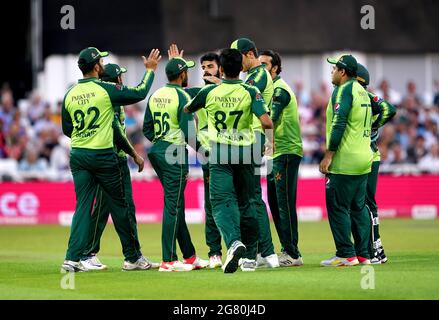 Pakistan's Babar Azam celebrates with his team-mates after taking the wicket of England's Jason Roy during the Twenty20 International match at Trent Bridge, Nottingham. Picture date: Friday July 16, 2021. Stock Photo