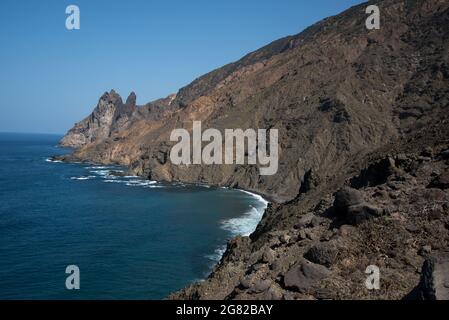 Los Organos are volcanic rocks at the coast of the northwest of La Gomera in the Canary Islands with an organ pipe structure visible only from sea. Stock Photo