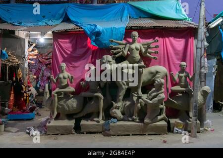 Kolkata, West Bengal, India - 7th October 2018 : Clay idol of Goddess Durga, under preparation for 'Durga Puja' festival in Kumartuli. Mother with her Stock Photo