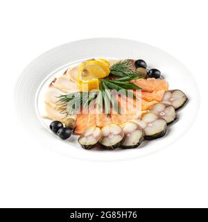 Assorted smoked fish platter on wooden background Stock Photo