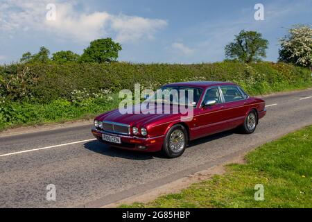 1996 90s Daimler 1996 DOUBLE SIX LWB 3080cc luxury saloon en-route to Capesthorne Hall classic May car show, Cheshire, UK Stock Photo