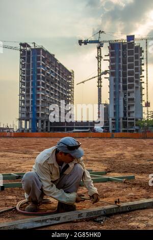 A construction worker in front of building at gading serpong indonesia Stock Photo