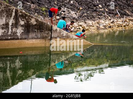 Kids playing catching the fist on east nusa tenggara Stock Photo