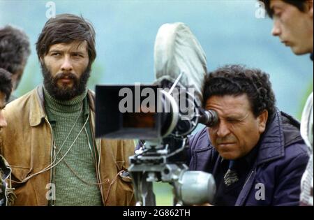 Romania,1979. Director Gheorghe Vitanidis behind the camera during the production of the movie 'Burebista'. Director of photography Petru Maier- left. Stock Photo