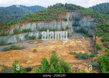 Reforestation of the terraced ground at the old mine in Troodos mountains near Kapedes, Cyprus. This area is rich with copper ore and sulfide deposits Stock Photo