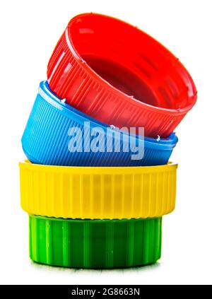 Colorful plastic bottle caps isolated on white. Recycling Stock Photo