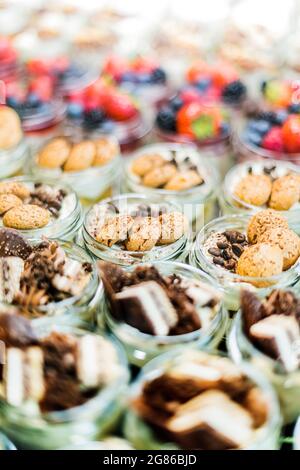 Assorted bio desserts presented in a cafe refrigerator Stock Photo