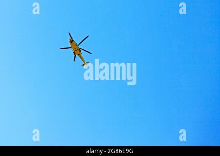 Umea, Norrland Sweden - June 5, 2021: ambulance helicopter flies over my head Stock Photo