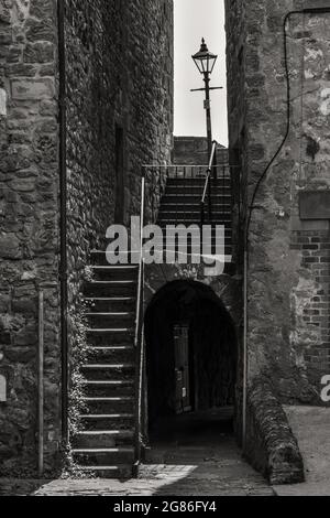 Sally Port is an old street in Berwick upon Tweed, Northumberland. Based on the painting by L.S. Lowry. Stock Photo