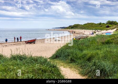 The beach at Low Newton-on-the Sea on the Northumberland coast, England Stock Photo