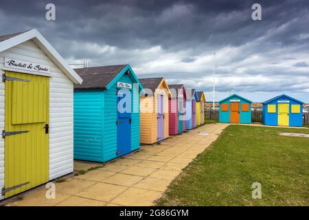 The colourful beach huts at Amble on the Northumberland coast, England, Uk. Stock Photo