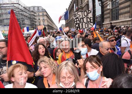 Paris, France. 17th July, 2021. Several tens of thousands of people demontrate against the covid-19 vaccination and health pass, at the call of Florian Philipot and Nicolas Dupond-Aignan, in Paris, France, on July 17, 2021. Photo by Pierrick Villette/Avenir Pictures/ABACAPRESS.COM Credit: Abaca Press/Alamy Live News Stock Photo