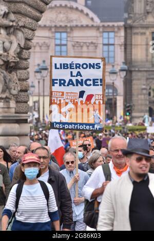 Paris, France. 17th July, 2021. Several tens of thousands of people demontrate against the covid-19 vaccination and health pass, at the call of Florian Philipot and Nicolas Dupond-Aignan, in Paris, France, on July 17, 2021. Photo by Pierrick Villette/Avenir Pictures/ABACAPRESS.COM Credit: Abaca Press/Alamy Live News Stock Photo