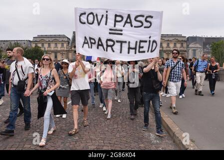 Paris, France. 17th July, 2021. Several tens of thousands of people demontrate against the covid-19 vaccination and health pass, at the call of Florian Philipot and Nicolas Dupond-Aignan, in Paris, France, on July 17, 2021. Photo by Pierrick Villette/Avenir Pictures/ABACAPRESS.COM Credit: Abaca Press/Alamy Live News Stock Photo