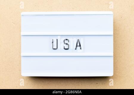 White lightbox with word USA (United states of America) on wood background Stock Photo