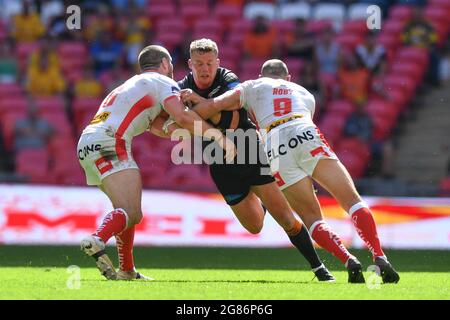 London, UK. 17th July, 2021. Adam Milner (13) of Castleford Tigers in the tackle of James Roby (9) of St Helens during the game in London, United Kingdom on 7/17/2021. (Photo by Richard Long/ RL Photography/News Images/Sipa USA) Credit: Sipa USA/Alamy Live News Stock Photo
