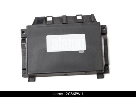 Plastic car engine control unit with metal elements on a white isolated background is the connecting center of various subsystems, units and assemblie Stock Photo