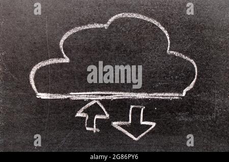 White chalk hand drawing in cloud with up and down arrow icon shape on black board background (Concept for cloud computer download and upload data, co Stock Photo