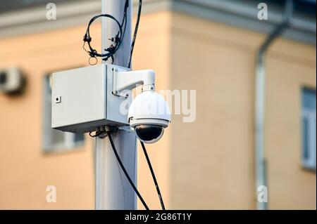 video surveillance camera mounted on a pole Stock Photo