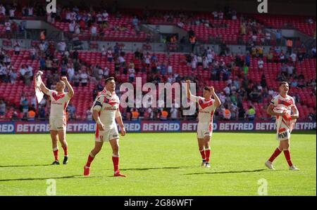 St Helens' Louie McCarthy-Scarsbrook (2nd left) and team-mates celebrate after the Betfred Challenge Cup final match at Wembley Stadium, London. Picture date: Saturday July 17, 2021. Stock Photo