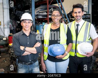 Portraits of dedicated and dedicated auto parts warehouse teams include female engineers and male technicians within working environments. Stock Photo