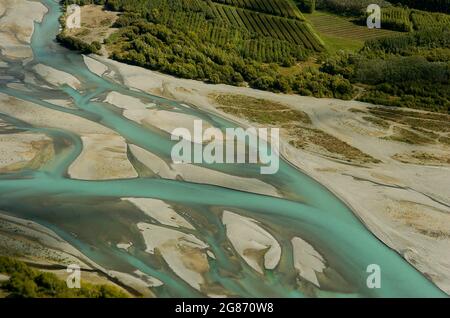 Fertile farmland around the Delta where Clutha River enters Lake Dunstan, Central Otago, South Island, New Zealand. aerial view Stock Photo