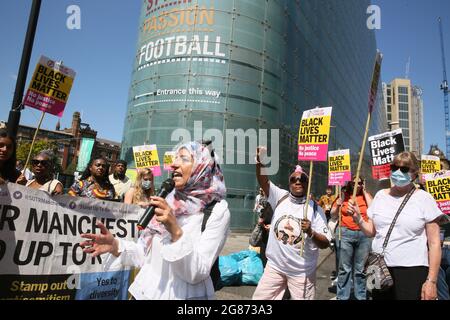 Manchester, UK. 17th July, 2021.Solidarity with Saka, Rashford and Sancho, 'End the racist abuse' protest takes place with demonstrators assembling in St Peters Square and marching to the National Football Museum where they took the knee. Cathedral Gardens, Manchester, UK. Credit: Barbara Cook/Alamy Live News Stock Photo