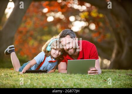 webinar video lesson. online education on computer. back to school. father and son Stock Photo