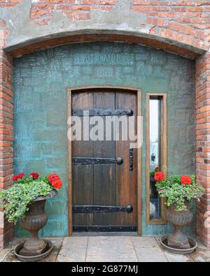 A door into the old clam cannery in Port Orchard, WA. It is now a residence. Stock Photo