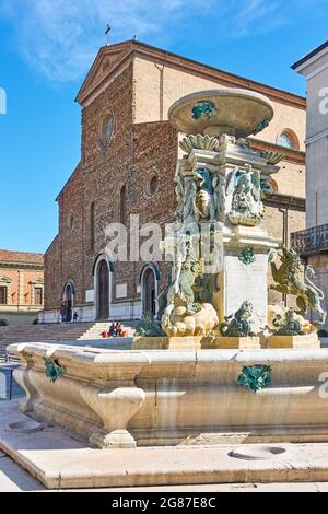 Faenza, Italy - February 27, 2020: Cathedral of Saint Peter the Apostle and fountain on Piazza Liberta in Faenza, Emilia-Romagna, Italy Stock Photo