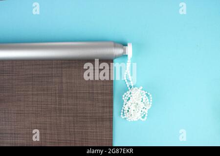 Sun and Heat Protection. Roller blinds are made from texture material Stock Photo