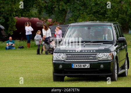 Windsor, Berkshire, UK. 3rd July, 2021. Her Majesty the Queen drives her Range Rover at Royal Windsor Horse Show. The Queen looked relaxed and happy to be watching her horses compete. Credit: Maureen McLean/Alamy Stock Photo