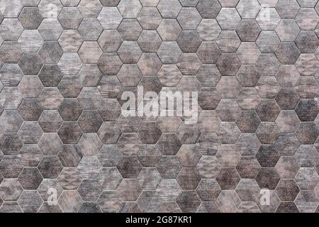 Hexagonal tile wall, gray hexagonal tile, outdoor wall, space for text. Stock Photo