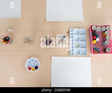 Top view of drawing and painting supplies prepared for elementary school art classrooms. Stock Photo
