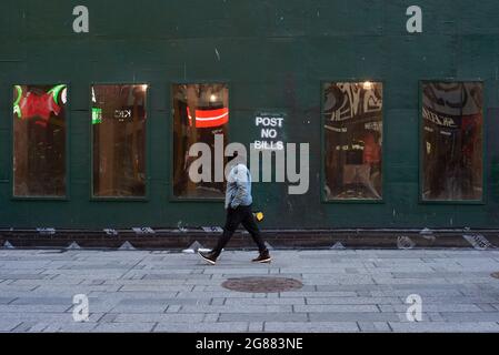 Man walking on the street of New York City. Street Photography in New York. Stock Photo