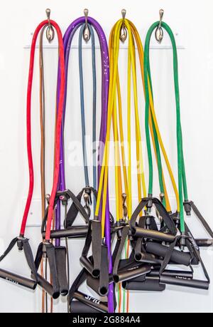 collection of resistance bands at a gym Stock Photo