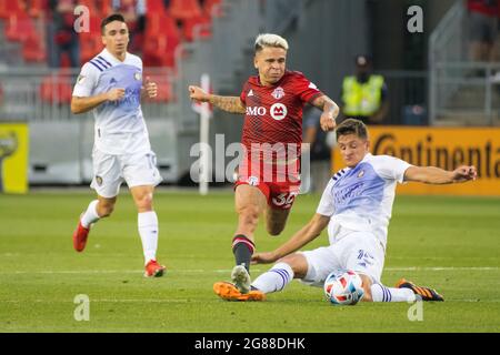 Toronto, Canada. 17th July, 2021. Yeferson Soteldo (30), Rodrigo Schlegel (15) and Mauricio Pereyra (10) in action during the MLS game between between Toronto FC and Orlando City SC at BMO Field. (Final score; Toronto FC 1-1 Orlando City SC). (Photo by Angel Marchini/SOPA Images/Sipa USA) Credit: Sipa USA/Alamy Live News Stock Photo