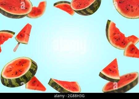 Ripe watermelon cut into pieces flying in the air. Floating, flying, levitating sliced fresh watermelon on trendy colored background. Creative and abs Stock Photo