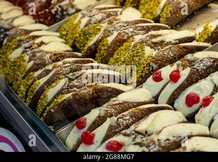 typical Sicilian cannoli stuffed with ricotta. Traditional homemade recipe Stock Photo