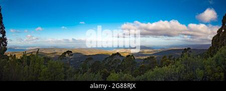 A late afternoon panoramic view from part way up Mount Wellington of south Hobart, the capital city of Tasmania and the Derwent River in Australia Stock Photo