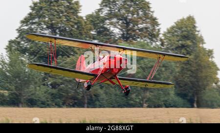 Old Warden, UK - 4th August 2019: A Hatz CB-1 Biplane in flight about to land Stock Photo