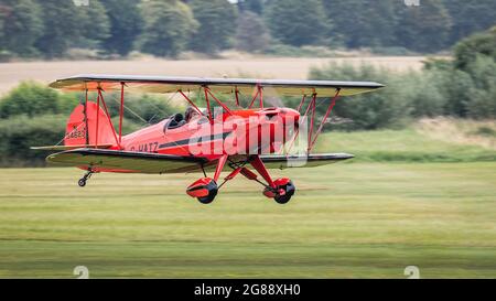 Old Warden, UK - 4th August 2019: A Hatz CB-1 Biplane in flight about to land Stock Photo