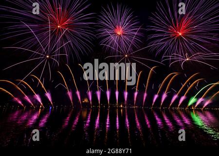 Fireworks explode over the St. Mark's Basin for the Redentore Celebrations during the night from 17 to 18 July, 2021 in Venice, Italy. Redentore Stock Photo