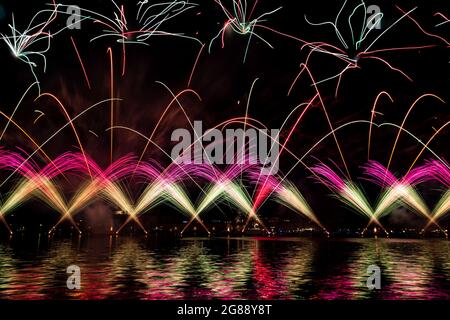 Fireworks explode over the St. Mark's Basin for the Redentore Celebrations during the night from 17 to 18 July, 2021 in Venice, Italy. Redentore Stock Photo